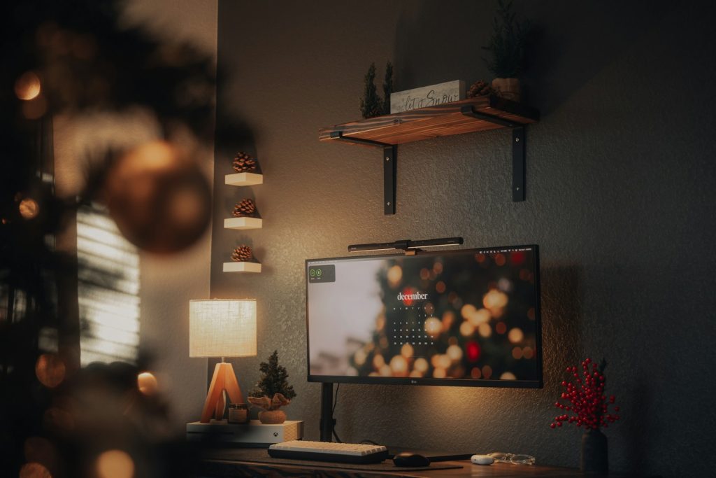 A living room with a television and a desk